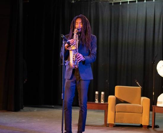 Craig Beacham plays saxophone in Strebel Auditorium on February 1, 2023.